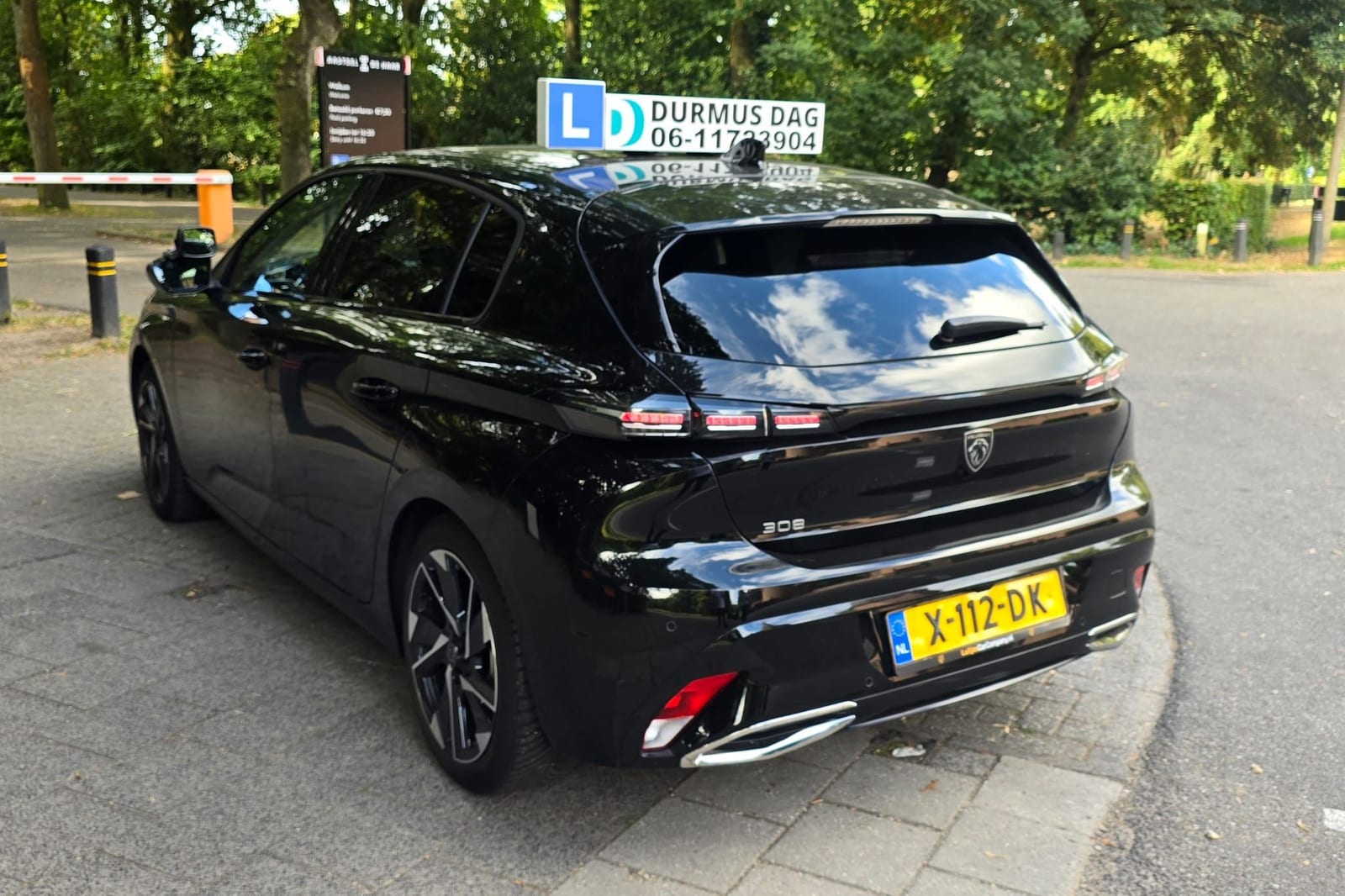 Rear exterior of the Peugeot driving school car